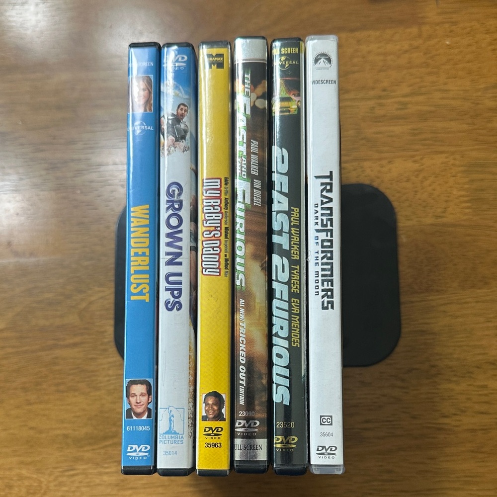 Mixed DVD Movie Collection – Blue, White, Yellow, Black Spines